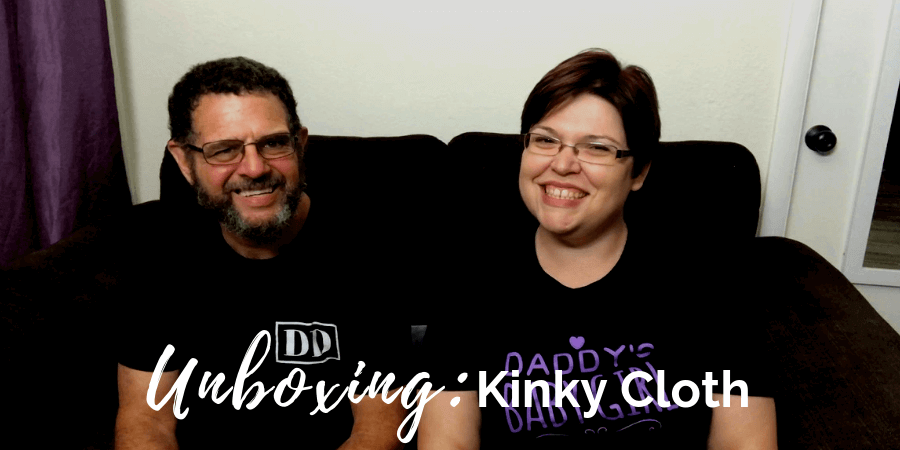 Kayla Lords and John Brownstone sitting on a couch, smiling, talking about Kinky Cloth