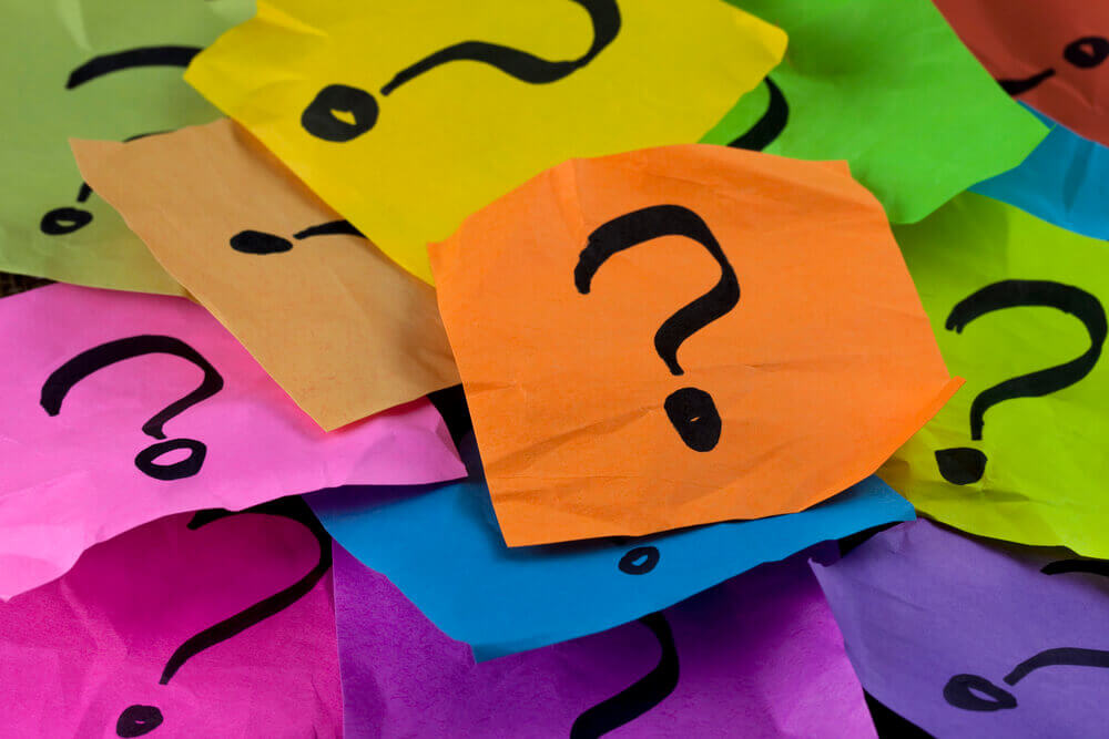 question marks on brightly colored post-it notes -- we're answering BDSM questions