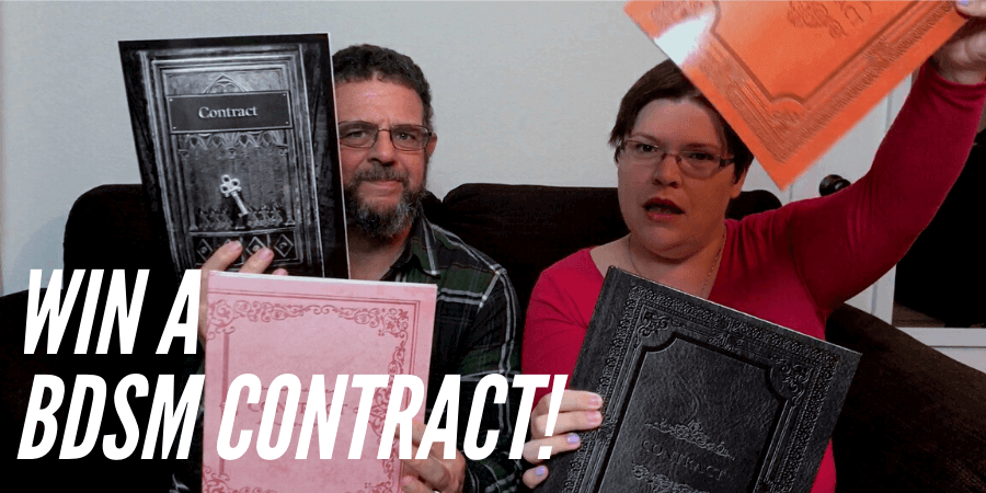 Kayla Lords and John Brownstone holding copies of BDSM Contracts for giveaway