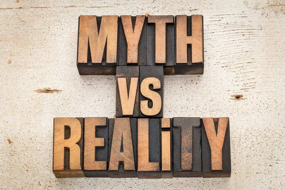 Large letters spelling out myth vs reality on neutral backdrop -- as we discuss whether a submissive can or should fulfill every single need their Dominant has